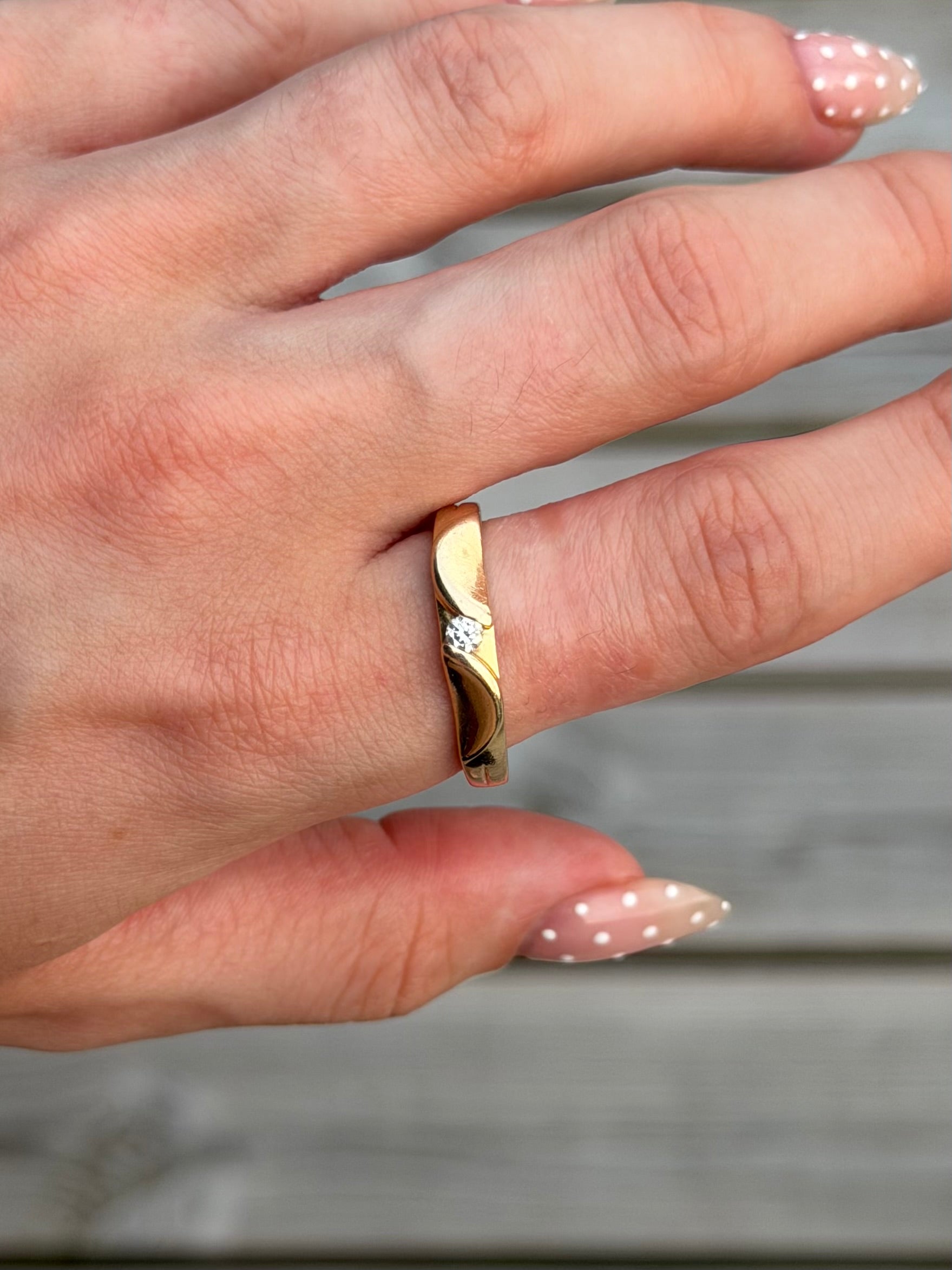 Vintage Hearts & Arrows 14 karat guldring med 0,10 ct. diamant