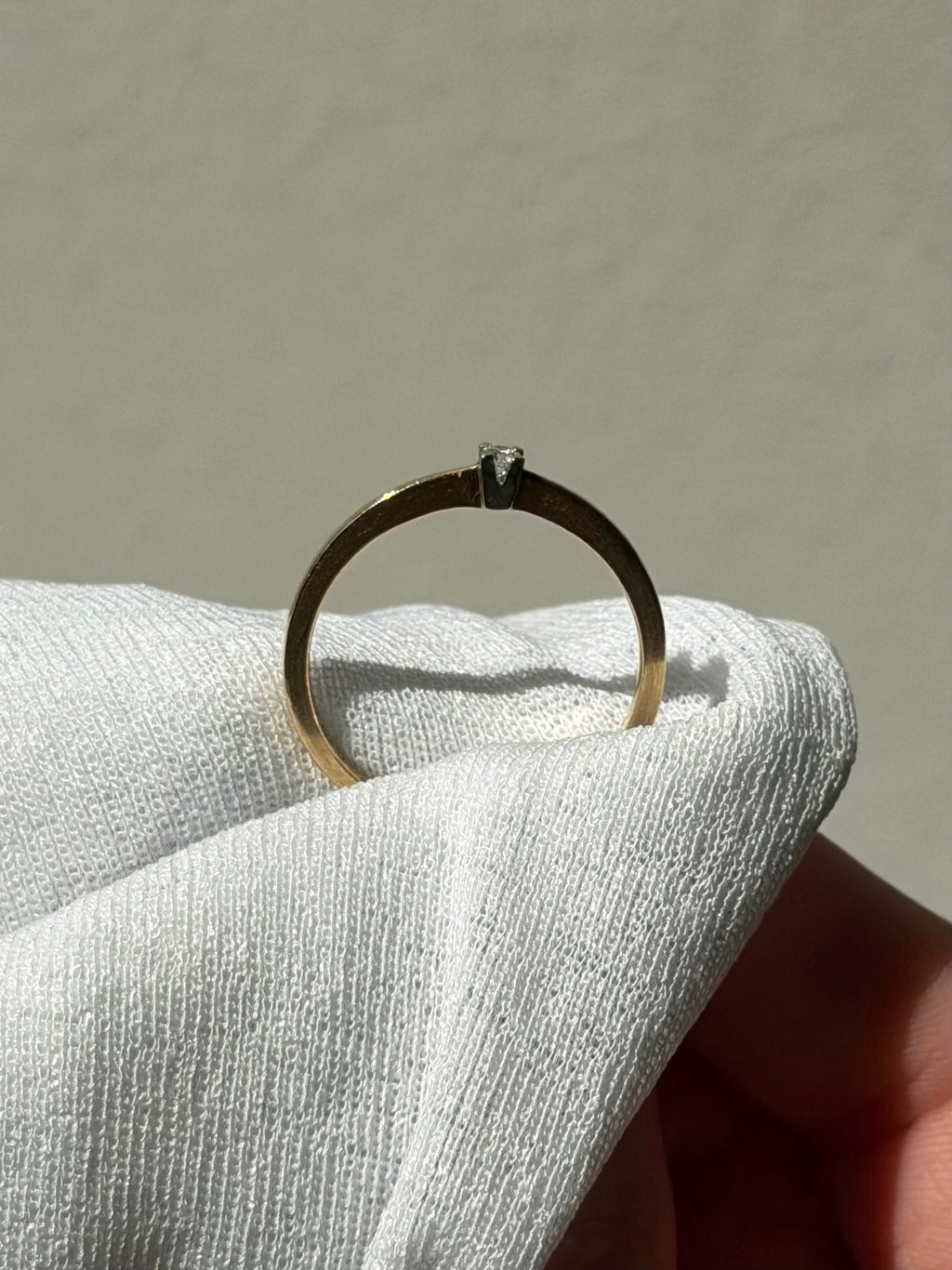 Vintage 14 karat solitairering med 0,05 ct. brilliant, str 62