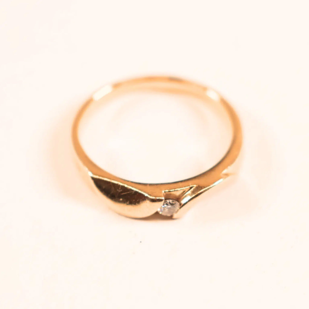 Vintage Hearts & Arrows 14 karat guldring med 0,10 ct. diamant
