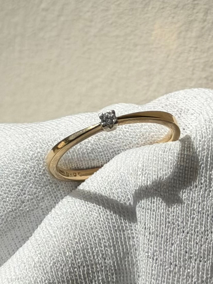 Vintage 14 karat solitairering med 0,05 ct. brilliant, str 62