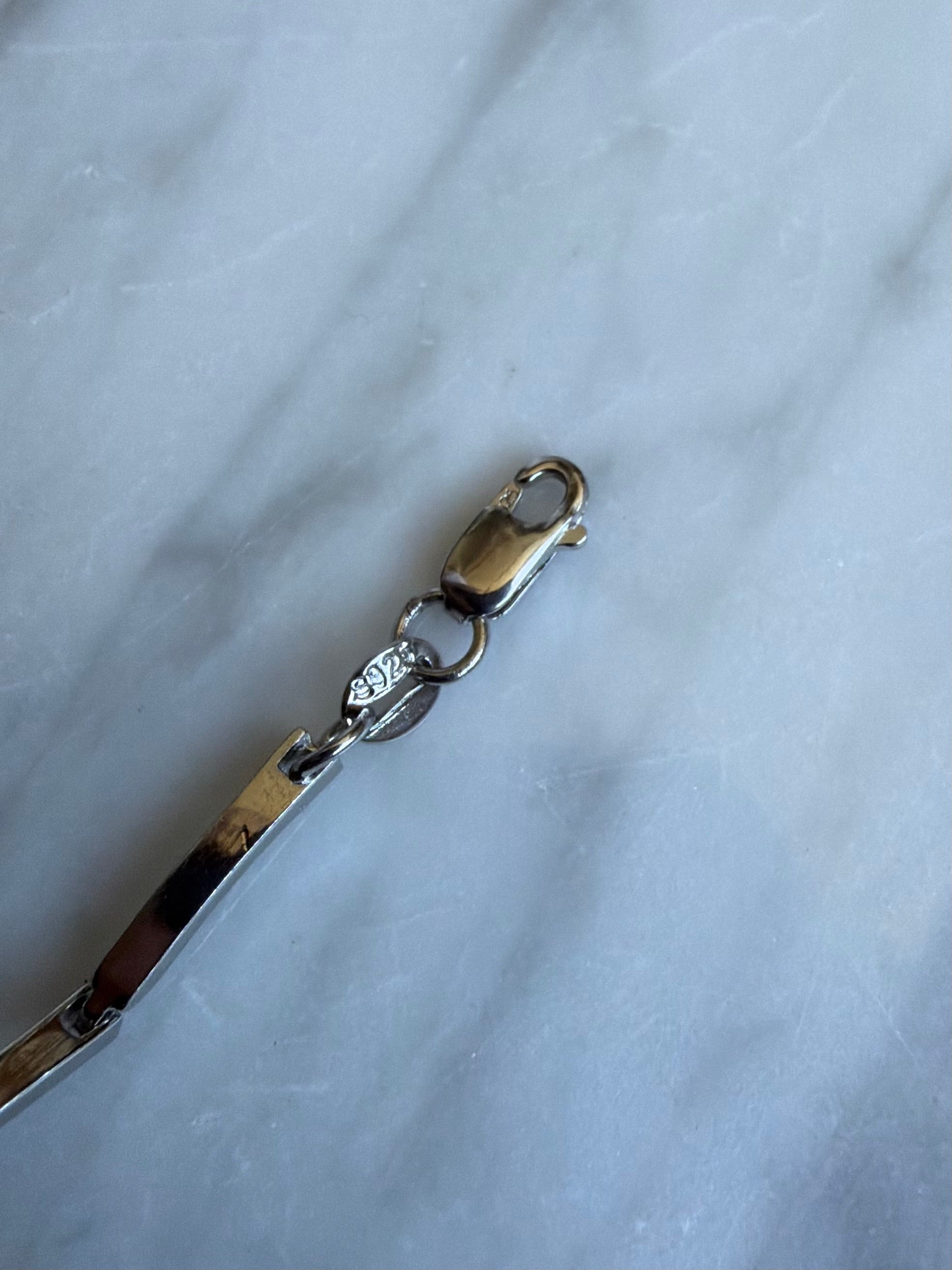 Vintage sterlingsølv armbånd med aflange led og 3 bølger isat klare sten, 18-21cm